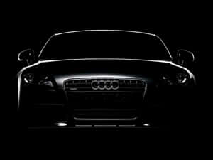 Audi 汽車正面視圖，黑色背景上帶有發光線條 — Audi R8 GIF 壁紙