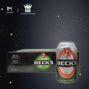 Beck's 啤酒罐和盒子，帶有金色星星和閃粉，置於黑暗背景上。