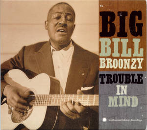 Big Bill Broonzy在復古專輯封面《Trouble in Mind》上彈結他。