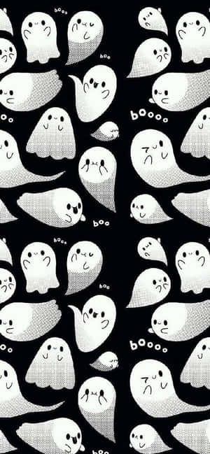 可愛的卡通鬼魂，在黑色點狀背景上帶有「boo」文字。 — 銀河A 壁紙