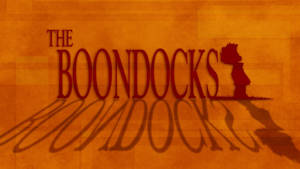 帶有紋理的橙色背景上，The Boondocks 標題帶有兒童剪影和陰影。 — 鄉下地方 壁紙
