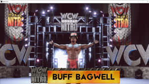 摔角手 Buff Bagwell 在 WCW Monday Nitro 舞台上張開雙臂擺姿勢。 — 摔角 GIF 壁紙