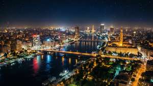 星空下開羅城市夜景，尼羅河與橋樑