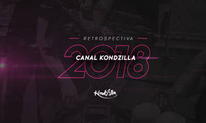 粉紅色霓虹文字「Retrospectiva 2018 Canal Kondzilla」在黑暗模糊的滑板場景上。