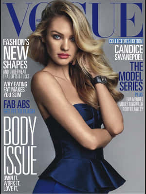 Candice Swanepoel 穿著海軍藍連衣裙出現在《Vogue》雜誌封面，帶有粗體文字。 — 城市景觀 壁紙