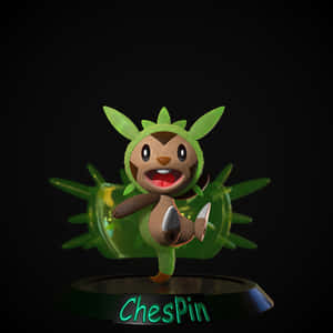一個發光的綠色和棕色Chespin公仔在黑色底座上，名字亮起。