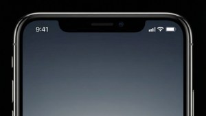 黑色iPhone在深色屏幕上顯示時間9:41和狀態圖標
