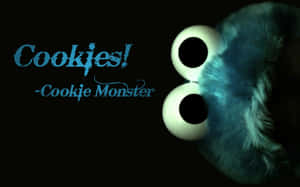 Cookie Monster 的大眼睛和毛茸茸的藍色臉部，文字寫著 Cookies — 曲奇 壁紙