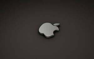 磨砂深灰色背景上的時尚銀色Apple標誌