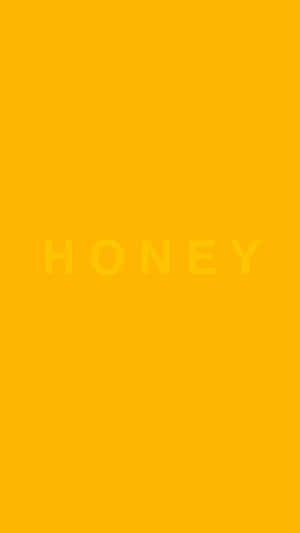 黃色背景，中間有淺黃色的文字honey。 — 美學黃色 壁紙