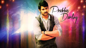交叉雙臂嘅男人喺充滿活力嘅發光背景中，有文字Prabhas Darling