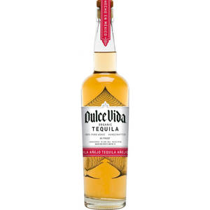 一瓶Dulce Vida Organic Tequila Añejo，裝有金色液體和紅色標籤。