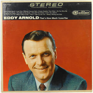 Eddy Arnold身穿西裝在紅色背景上微笑的復古專輯封面。