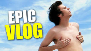 年輕男子喺藍天下雙手放喺心口，有「EPIC VLOG」字樣。