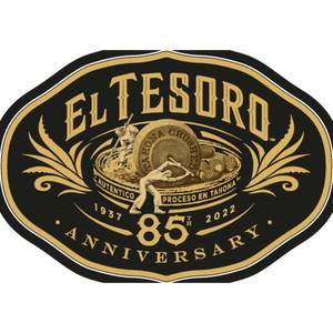 El Tesoro 85 週年標誌，帶有龍舌蘭壓碎場景和華麗金色設計。
