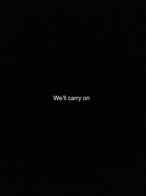 黑色背景，白色文字寫著 We'll carry on