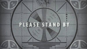 帶有「PLEASE STAND BY」文字和角形網格線的雷達屏幕。
