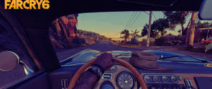 玩家在《Far Cry 6》中駕駛經典車穿越熱帶日落。