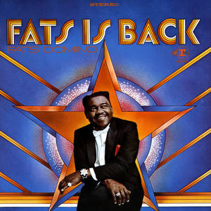 Fats Domino 身穿燕尾服，出現在帶有星爆設計的復古專輯封面上。 — 音樂 GIF 壁紙