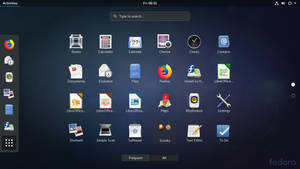 深藍色背景上帶有應用程式圖示的 Linux 桌面