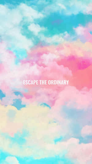 帶有文字 escape the ordinary 的粉彩水彩雲 — 唯美雲朵動態 壁紙