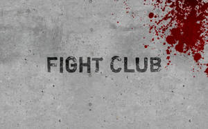 混凝土牆上嘅 FIGHT CLUB 塗鴉，帶有紅色血濺。