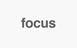 「focus」呢個詞用灰色文字顯示喺淺灰色背景上。 — 光 壁紙