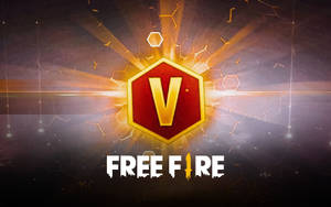 Free Fire 遊戲標誌，帶有發光的紅色六邊形和金色 V 符號。