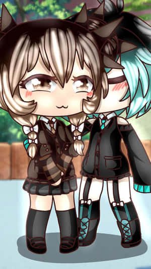 兩個有貓耳同校服嘅chibi動漫女仔一齊企喺戶外。 — Gacha life GIF 壁紙