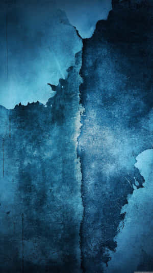 抽象的藍色水彩紋理，帶有磨損邊緣和分層塗料效果。