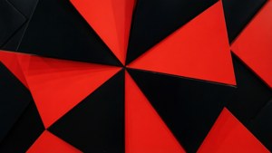 紅色和黑色三角形面板排列成放射狀幾何圖案