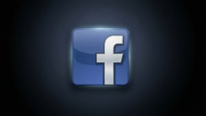Facebook標誌圖示，在深色背景上發出藍光