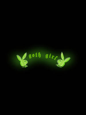 發光綠色閃粉兔仔標誌，帶goth girl文字，黑色背景。