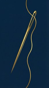 金色針與線在深藍色背景上