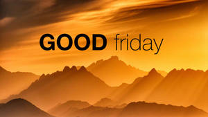 夕陽下的金色山脈與文字GOOD friday
