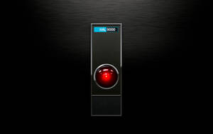 拉絲金屬背景上帶有紅色眼睛和藍色標籤的HAL 9000電腦