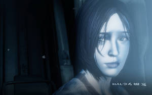 來自Halo 4的藍色燈光女性角色，在昏暗的未來設定中。 — 4K Marvel 壁紙