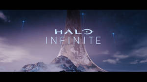 Halo Infinite 標題畫面，在星空下雪山中的巨大獨石。