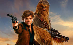 Han Solo 和 Chewbacca 在日落時手持爆能槍。 — 星際大戰 壁紙