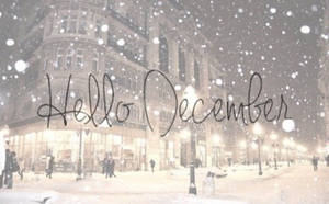 雪夜城市街道，有人行走和「Hello December」文字。