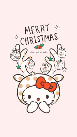 Hello Kitty 作為馴鹿，帶有聖誕裝飾和星星，背景是粉紅色 — Kawaii 聖誕 GIF 壁紙