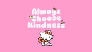 Hello Kitty 手持帶有「Always Choose Kindness」文字的心形，附近有小動物。
