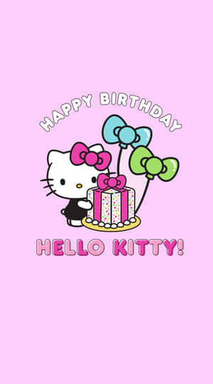 Hello Kitty 在粉紅色背景下拿著生日蛋糕和氣球。 — Hello kitty 美學 GIF 壁紙