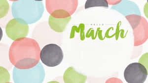 綠色草書的Hello March文字，周圍環繞著色彩繽紛的水彩圓點。