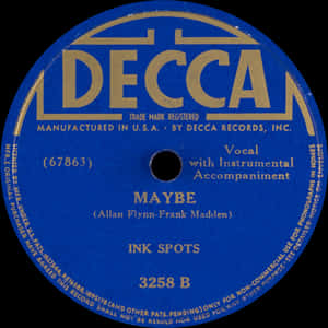 復古藍色 Decca 唱片標籤的特寫，帶有金色字體和歌曲細節。