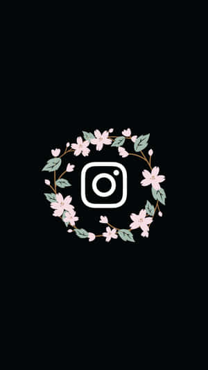 Instagram標誌以粉紅色櫻花和綠色葉子鑲嵌在黑色背景上。