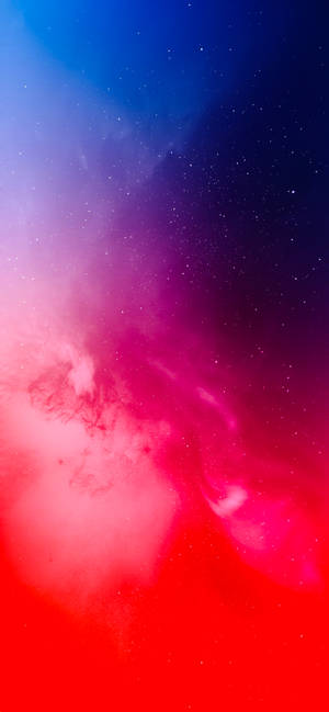 色彩繽紛的宇宙星雲，帶有紅色和藍色的雲層及星星。