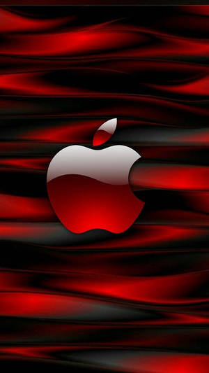 亮白色Apple標誌在流動的紅色和黑色布料背景上