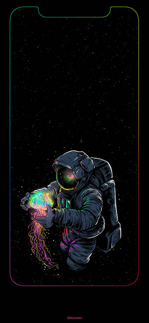 太空人在星空背景下於太空中手持發光霓虹水母。