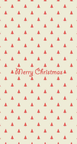 奶油色背景上的紅色聖誕樹和Merry Christmas文字。
